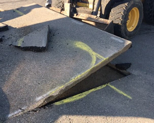 Removing asphalt with skid steer