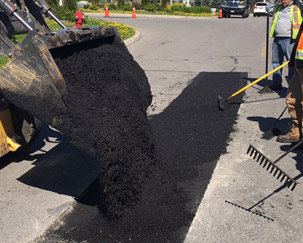 Repaving with hot asphalt